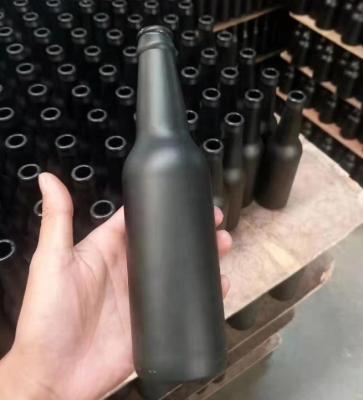 China Eco-friendly Recyclable 330ml Frosted Black Glass Beer Bottle 500ml Amber Glass Bottle With Metal Cap for sale