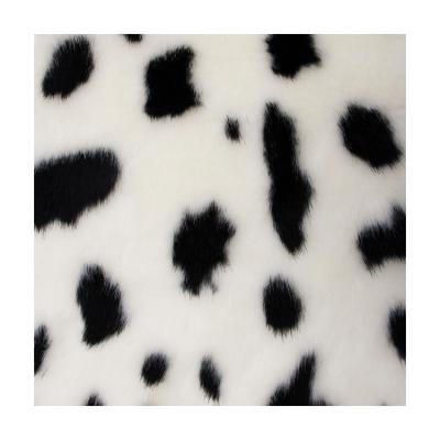 China Garment Faux Fur Fabric For Home Textile Garment Black And White Dotted Mink Faux Fur for sale