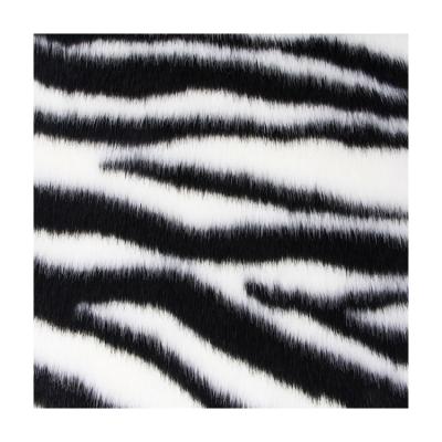 China Garment Faux Fur Fabric For Home Garment Textile Jacquard Zebra Pattern Soft And Textured, Black And White for sale