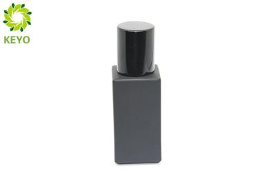 China Square Matte Black Glass Foundation Bottle 30ml With Round Pump Cap for sale