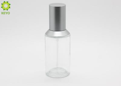 China Empty Cosmetic 40ml Moisturizing Lotion Clear Glass Bottles With Silver Plastic Pump Cap for sale