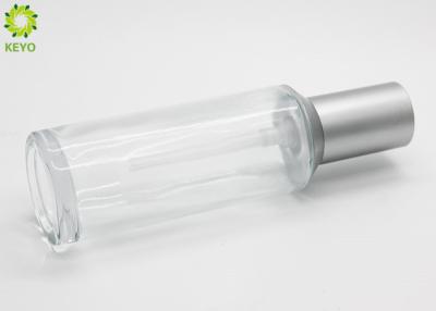 China Slanted Silver Plastic Pump Cap 60ml Clear Glass Pump Bottles For Clearing Lotion for sale