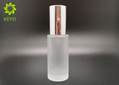 China Clear 30ml Frosted Glass Bottle Foundation Cosmetics Packing With Silver Collar Pump for sale