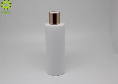 China botellas plásticas del champú y del acondicionador del HDPE de 250ml Matt con el casquillo de aluminio del disco del oro en venta