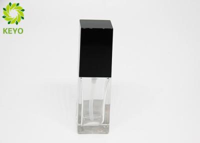 China 30ml Square Glass Clear Foundation Pump Bottle Skin Serum Makeup Container for sale