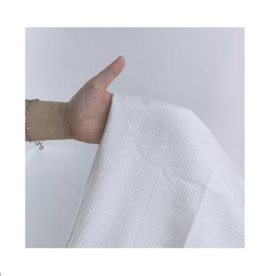 China Adorable Luxury Thick Bath Wrap Towel Hygienic Price Nonwoven Fabric Disposable Towel Bath For Body for sale