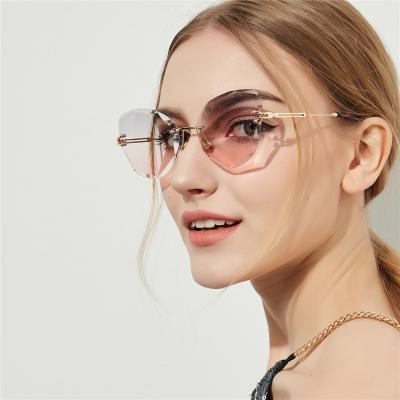 China Fashion Sunglasses Rimless Sunglasses , Cat Eye Vintage Sunglasses Female Diamond Cut 2020 Fashion Sunglasses for sale