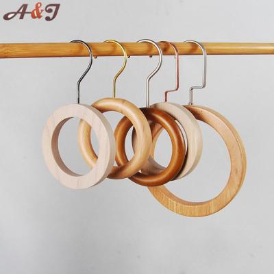 China Hot Sale Goods 2021 New Style Ring Rounded Wooden Hanger For Shop Salon Clothing Pants Scarf Hanger for sale