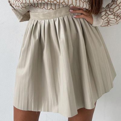 China Fashion Breathable High Waisted Casual Simple Loose Pleated Elegant Mini Women Solid Faux Leather Skirts for sale