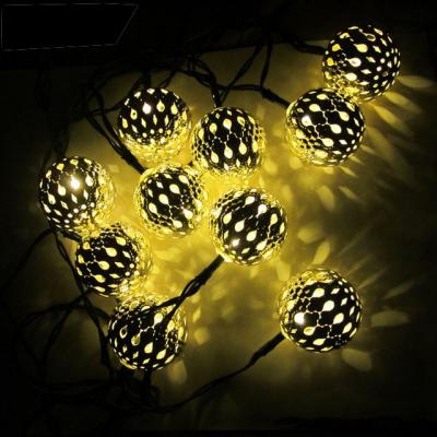 China Christmas 20 Led Solar Powered Outdoor Waterproof Moroccan String Ball Metal Ribbon Light Solar Lamp For Garden Christmas Decoration for sale