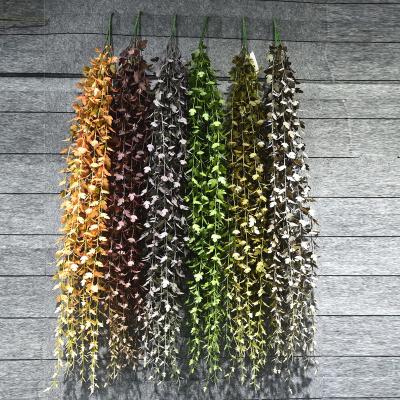 China Green Vertical Natural Artificial Rattan Wall Hanging Plant Garland Vines Plastic Vines Decoration For Artificial Plants for sale