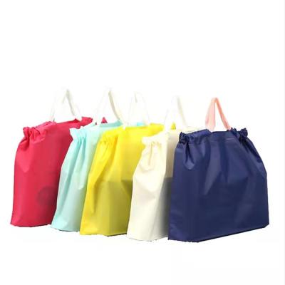 China 2021 Hot Sale Amazon Recyclable Custom Waterproof Plastic Drawstring Clothing Packaging Bags for sale