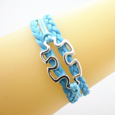 China Hot Hand-Crafted Alloy Jewelry Autism Awareness Charms Leather Braided Wrap Bracelet Autism Puzzle Bracelet for sale