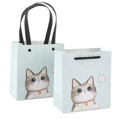 China Recyclable Cute Design Paper Gift Bags With Flat Paper Handle For Christmas Gifts Packaging for sale