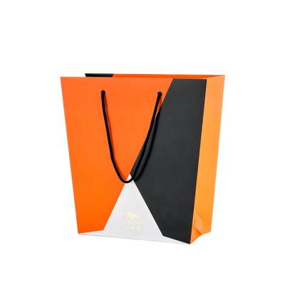 China Disposable luxury brand different shape promotion trapezoidal paper bag for sale