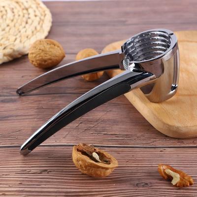 China Kitchen Viable Accessories Creative Heavy Zinc Alloy Funnel Shape Walnut Clip Nut Cookie Machine Opener 300G for sale