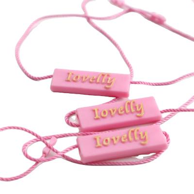 China Plastic Clothing Courier Bag Seal Custom Make Clothing / With Name Tag String Nylon Rope Hang Tag Lock Buckle for sale