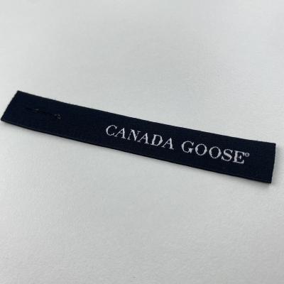 China Sustainable Cost-effective high-quality high-density bright color pattern wide variety Soft texture Custom color garment satin woven label for sale