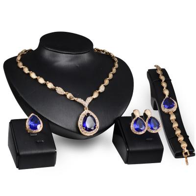 China Wholesale Yunchang CLASSIC Wholesale Fine Jewelry Crystal Rhinestone Main Blue Stone Type Gold Plated Wedding Jewelry Set for sale