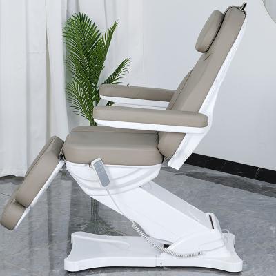 China Flexible Lifting Treatment Room Furniture White Base Motorized Mobile Beauty Salon And Facial Bed Chair for sale