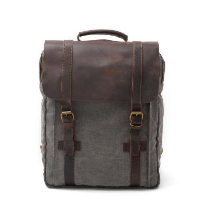 China Custom 2022 Factory Made Waterproof Logo Vintage Leather Canvas School Unisex Bag Men Laptop Backpack for sale