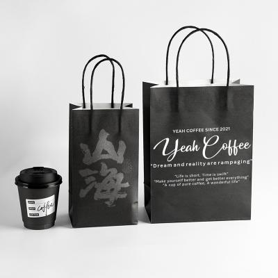 China Disposable Black paper bag disposable eco friendly paper bag with twisted handle,printing brown kraft paper bags for sale