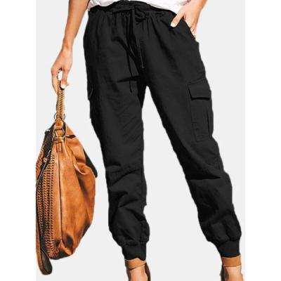 China Anti-wrinkle fashion best-selling new custom logo solid color casual sports pocket jumpsuits stretch casual pants for sale