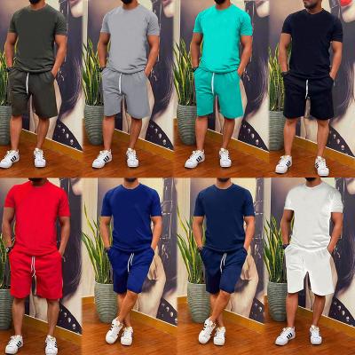 China Custom loose QUICK DRY cotton fashion LOGO autumn shorts short sleeve two-piece men's casual sports suit brand for sale