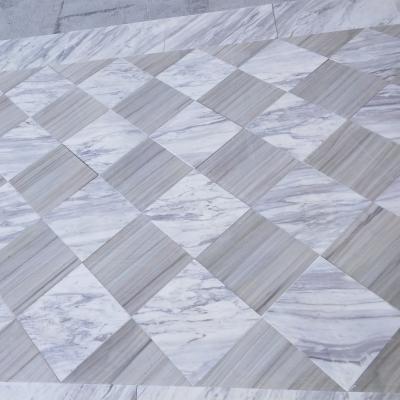 China Modern White Volakas Marble And White Marble Wood Flooring Designs for sale