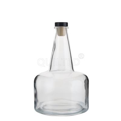 China Wholesale Custom Beverage Alcohol 700ml Clear Liquor Glass Wine Bottle With Cork Lid for sale