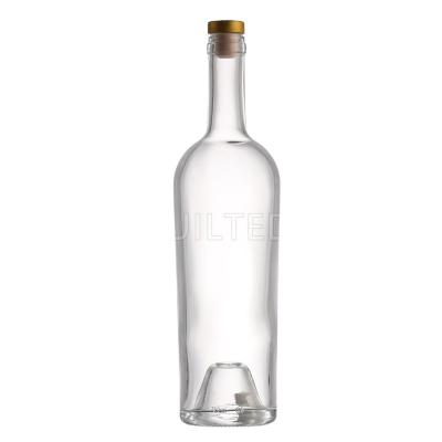 China Factory Beverage Stocked Direct Sale 750ml Liquor Vodka Clear Round Shape Liquor Glass Bottle With Cork Top for sale