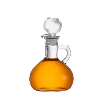 China Wholesale Unique Design Beverage Round Customizable Olive Oil Glass Bottle With Glass Cover for sale