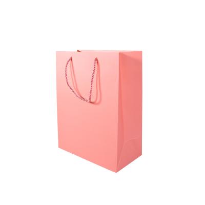 China Hot Selling Customized Different Logo Color Fashion Recyclable Shopping Bag Kraft Paper Paper Bags With Handles for sale