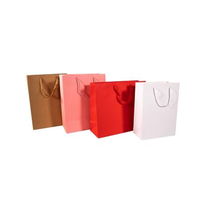 China Handmade Custom Luxury Garment Gift Paper Shopping Bags with Logo Print for sale