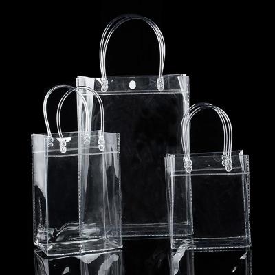 China Practical Daily Life Tote Bag Transparent Waterproof High Capacity Packing Gifts Bag Reusable Soft Handle PVC Tote Bag for sale