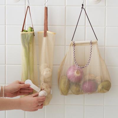 China Durable Hanging Mesh Kitchen Fruit And Vegetable Storage Bathroom Polyester Checkered Net Bag for sale