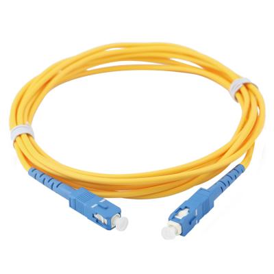 China Low Insertion Loss FC/SC/LC/ST UPC Single Mode Yellow Fiber Optic Jumper 3m Fiber Optic Patch Cord for sale