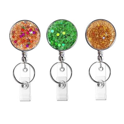 China ABS Resin Expansion Retractable Diamond Glitter Badge Reel UV Electroplating Insert for sale