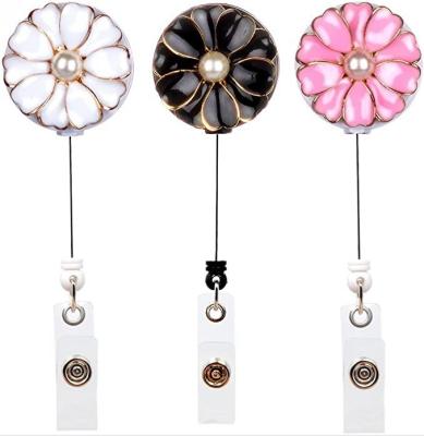 China Metal Alloy Camellia Retractable Badge Reel Easy Pull for sale