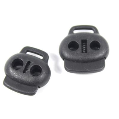 China Double Holes Accessories Rope Bag Plastic Lock Spring Stopper Toggle Tie for sale