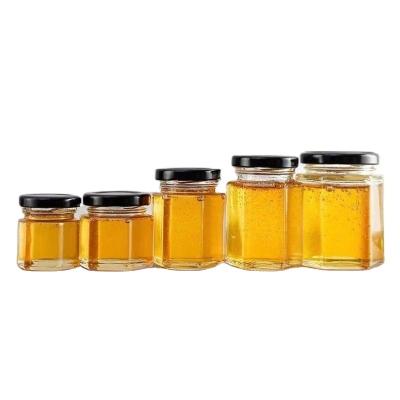 China Wholesale 500ml 1000ml transparent food bottle with lid for honey, jam canned food packaging, glass jars for sale