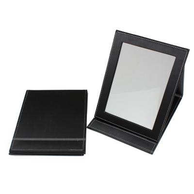 China Optical/Sunglasses Wearing Exquisite PU Leather Wrapped High Quality Folding Desktop Makeup Mirror For Optical Shop for sale