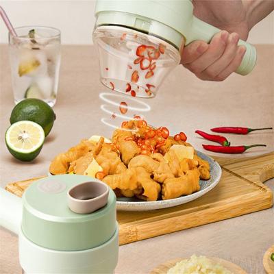 China ABS 2023 Hot Gatling Multifunctional Household Cooking Machine Electric Garlic Puree Garlic Automatic Garlic Stirrer for sale