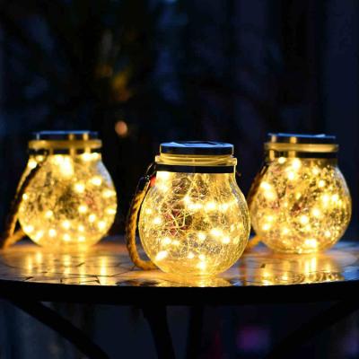 China It Charges During The Day And Works Automatically At Night Factory Wholesale IP65 Glass Holiday Outdoor Decorative Waterproof Solar Led Hanging Light for sale