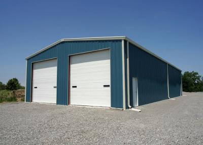 China Prefab Steel Building Homes / Steel Frame Residential Homes With Roller Shutter Door for sale