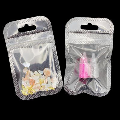 China Custom Logo One Side Transparent Hologram Moisture Proof Packaging Small Zipper Lock Mylar Hologram Bags for sale