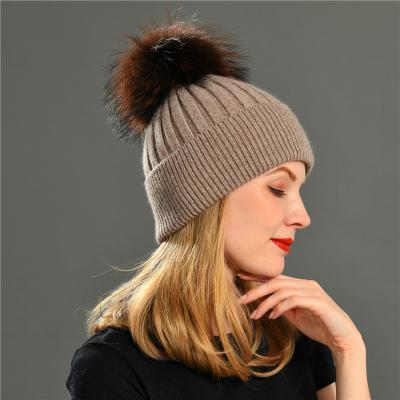 China Brand COMMON Beanie Knitted Winter Hat Caps With Real Fur Pom Pom Skullies Beanies For Women for sale