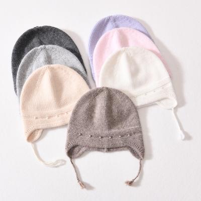 China COMMON Cute Unisex Winter Plain Cute Braid Baby Earflap Wholesale Label Kids Beanie Hat for sale