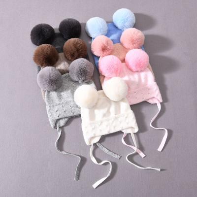 China Cashmere COMMON Pom Wholesale Knit Custom Kids Winter Knitted Beanie Hat Baby Cute Pom Snow Cap for sale