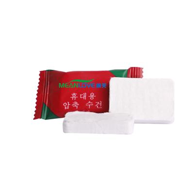 China Strong water absorption customized compressed cotton beach towel vacuum packed compress towels non woven fabric coin tissues yiwu for sale